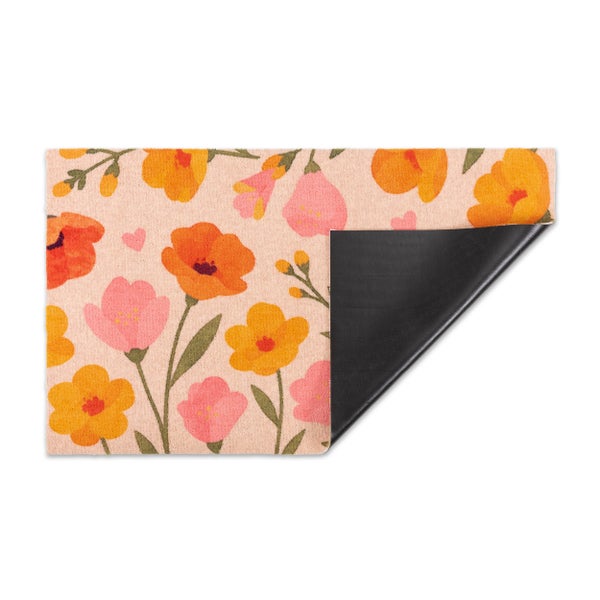 Fußmatte mit Blumenmuster und rutschfester Rückseite für den Innenbereich.