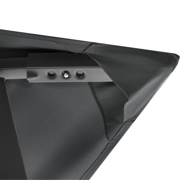 Runder strukturierter Teppich in Dunkelgrau mit körniger Oberflächentextur.