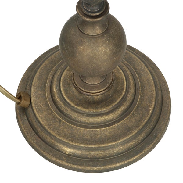 Detailaufnahme des Sockels einer Tischleuchte.