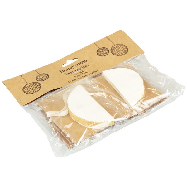 Packung mit vier Wabenförmigen Dekorationen mit acht Zentimeter Durchmesser