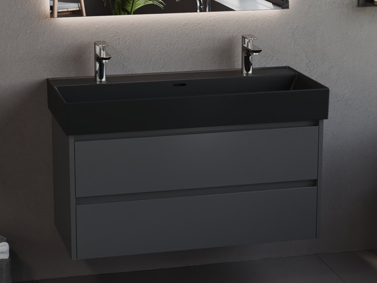 Waschtisch mit zwei Schubladen und Aufsatzwaschbecken im Badezimmer