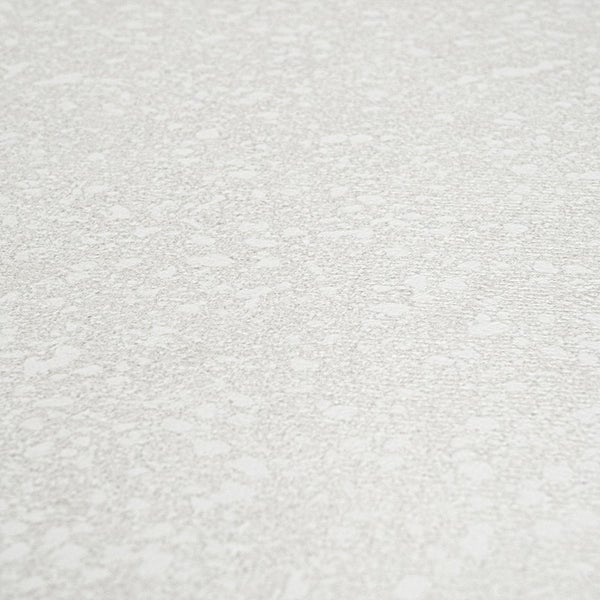Strukturierte Tapete mit feiner Sprenkeloptik für eine dekorative Wandgestaltung.