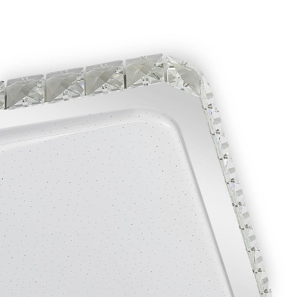 Quadratische Deckenleuchte mit kristallähnlicher Umrandung und Sternenhimmeldekor.