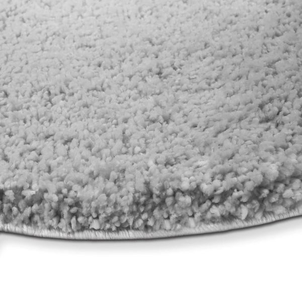 Detailansicht eines runden, textilen Badteppichs