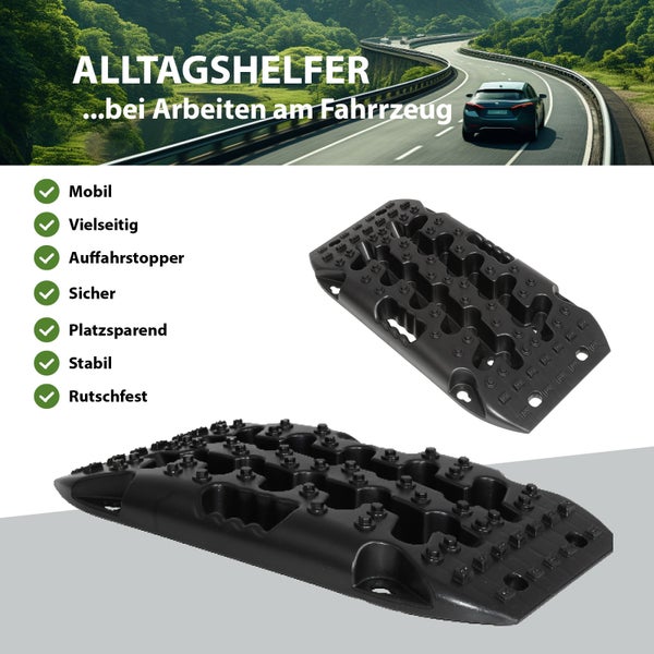 Schwarze Anfahrhilfen aus Kunststoff für Fahrzeuge mit rutschfester Oberfläche und stabilen Auffahrstoppern für Arbeiten am Auto.