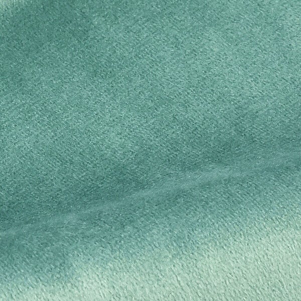 Strukturaufnahme von feinem Veloursstoff mit weicher Oberfläche.