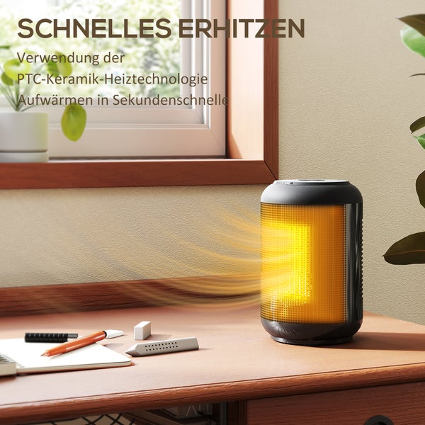 Tisch mit Heizlüfter und Büromaterial