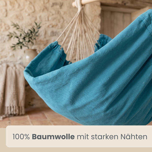 Hängesessel aus reiner Baumwolle mit stabilen Nähten in einer rustikalen Umgebung.