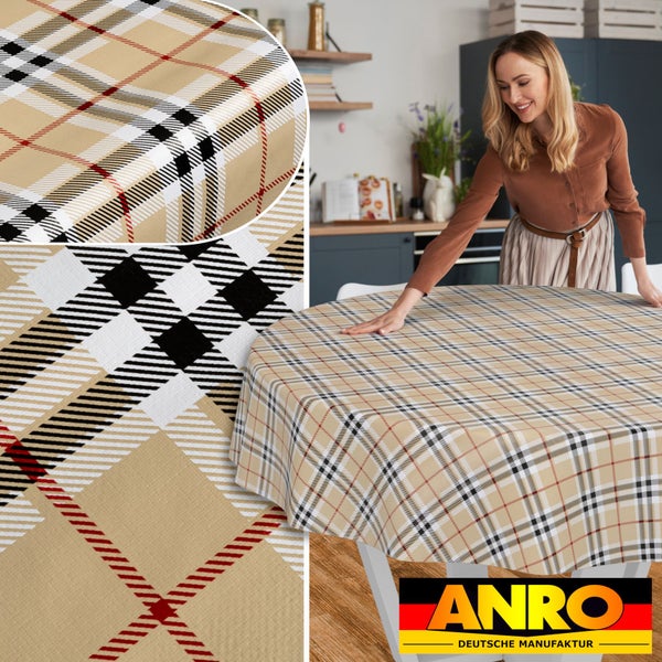 Runde Wachstischdecke mit Karomuster, von einer Frau auf einem Tisch in der Küche ausgebreitet, Detailansicht der Struktur, ANRO Logo.