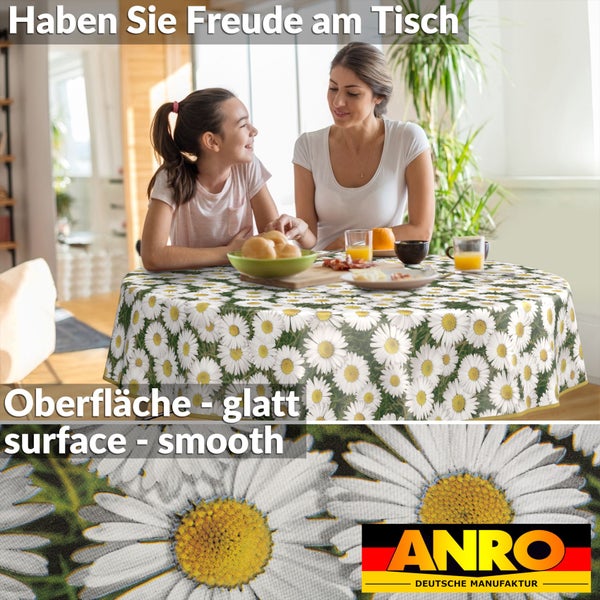 Tisch mit glatter Oberfläche und Tischdecke mit Gänseblümchenmuster, Mutter und Tochter sitzen am Tisch. ANRO Logo.