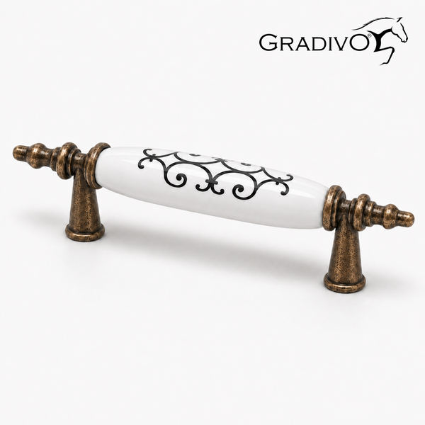 Antiker Möbelgriff aus Metall in Bronze-Optik mit weißem Keramik-Inlay und schwarzem Muster, Gradivo Logo.