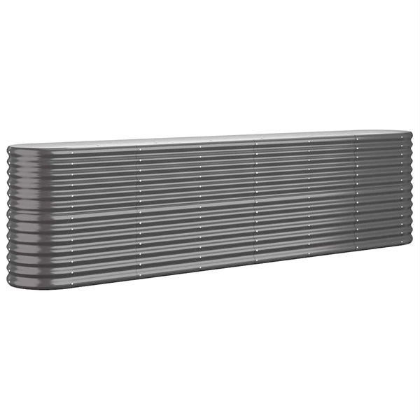 Hochbeet aus Metall mit blühenden Pflanzen im Garten