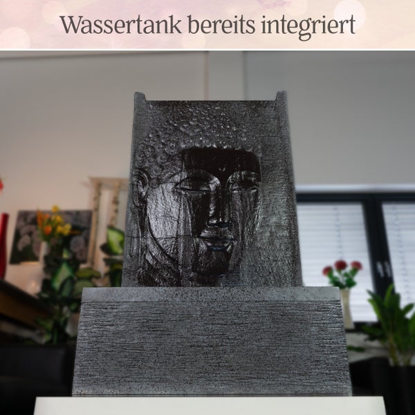 Zimmerbrunnen mit Buddha-Relief in Steinoptik und integriertem Wassertank.