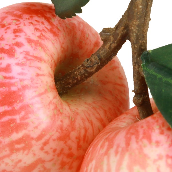 Dekorativer Kunstapfel mit Stiel und Blättern