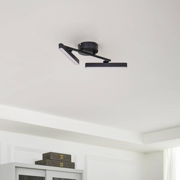 Detailansicht einer schwarzen Stange mit Schraubenbefestigung