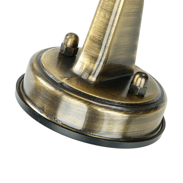 Detailansicht einer bronzefarbenen Leuchtenhalterung mit Schrauben