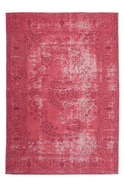 Rechteckiger Teppich im Vintage Look mit orientalischem Muster und Bordüre.