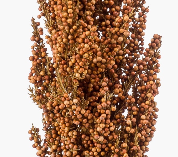 Künstliche Rose in Gelb mit grünem Stiel und Blättern.