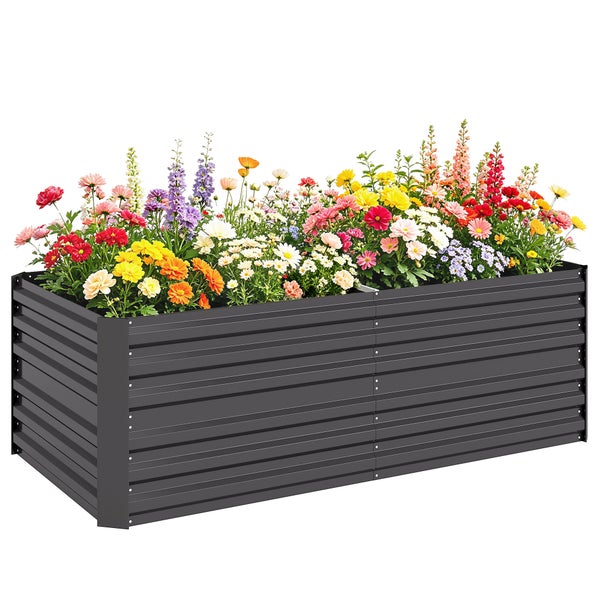 Rechteckiges Hochbeet aus Metall in Anthrazit mit Rillenstruktur, bepflanzt mit verschiedenen Blumen.