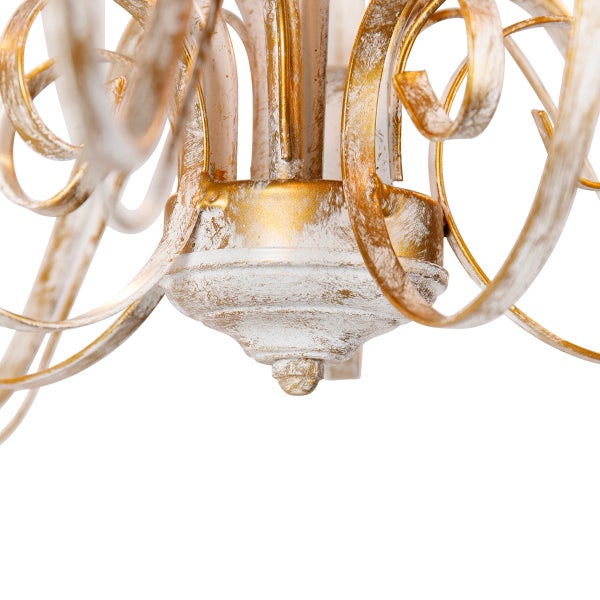 Detailansicht einer Deckenleuchte mit geschwungenen, verzierten Elementen