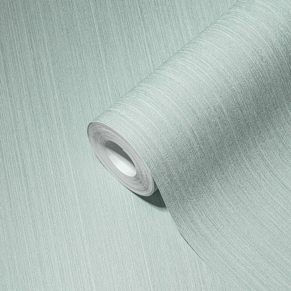 Szene mit drei bepflanzten Pflanzgefäßen im Außenbereich, die eine Gartendekoration darstellen