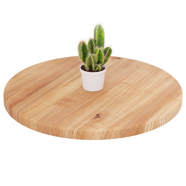 Runde Tischplatte aus Massivholz mit einer kleinen Kaktuspflanze.