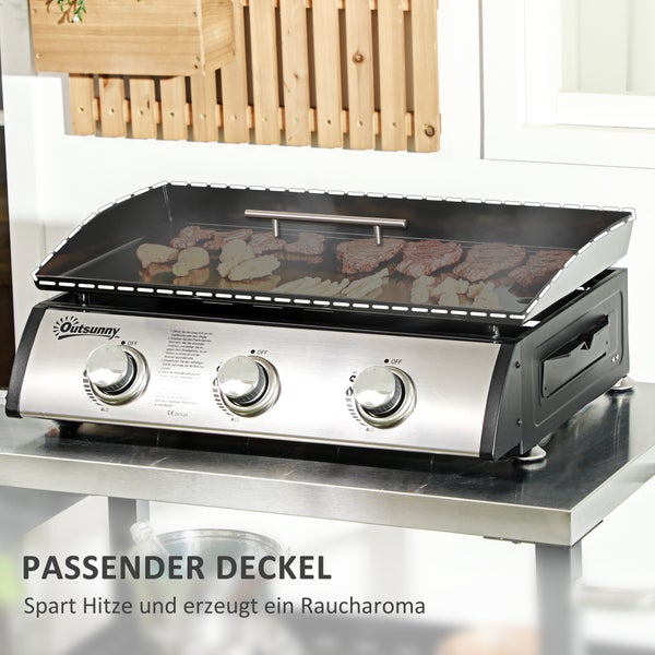 Outsunny Gasgrill mit drei Reglern, Edelstahlfront und passendem schwarzem Deckel über Fleisch und Gemüse auf einer Grillplatte.