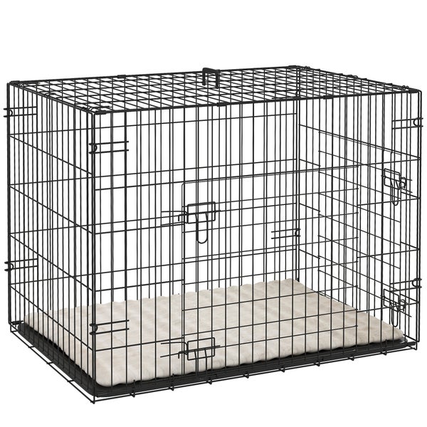 Schwarzer Hundekäfig aus Metalldraht mit zwei Türen und einer hellen Liegematte.