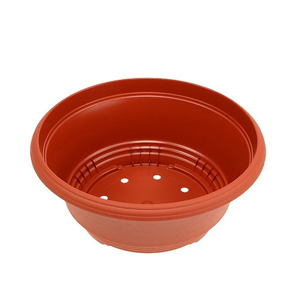 Pflanzschale aus Kunststoff in Terrakotta mit Drainagelöchern.