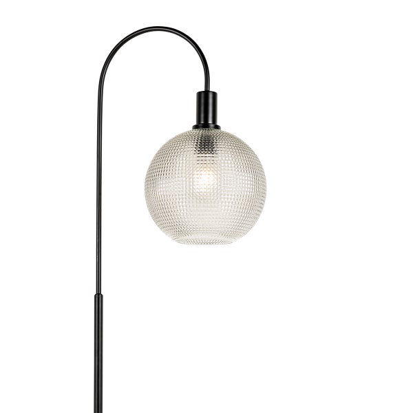 Stehlampe mit runder Glasabdeckung auf einem schwarzen Metallständer