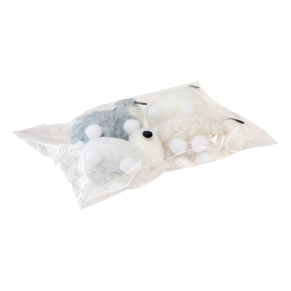 Dekorative Wollfiguren im Beutel