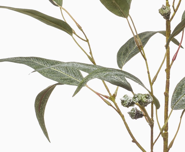 Künstliche Azalee mit rosa Blüten und grünen Blättern.