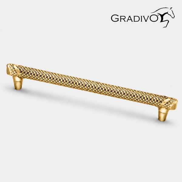 Goldfarbener Möbelgriff mit Rautenmuster und Gradivo Logo.