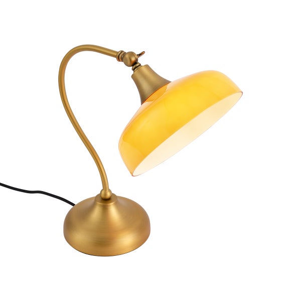 Schreibtischleuchte im Vintage-Stil mit geschwungenem Arm aus Metall in Altmessing-Optik und einem bernsteinfarbenen Glasschirm.