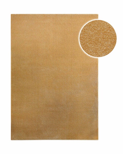 Rechteckiger Teppich mit kurzem Flor in Senfgelb und Detailansicht der Textur.