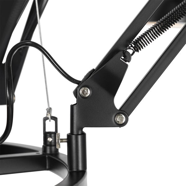 Detailaufnahme einer schwarzen Schreibtischlampe mit verstellbarem Arm