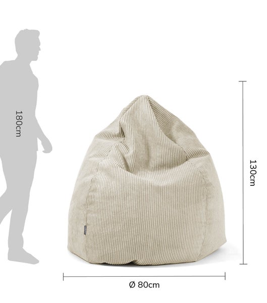 Baumstamm in einem Pflanzgefäß mit Kokosmatte