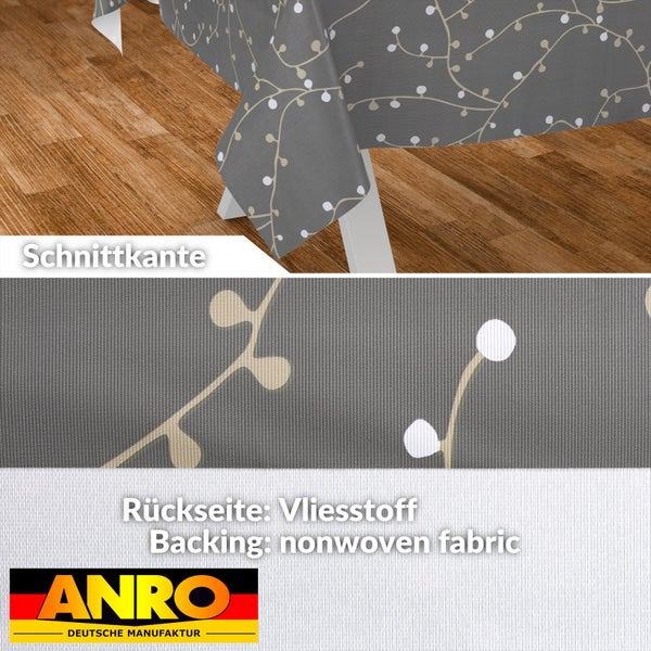 Abwaschbare Tischdecke mit Zweig-Muster, Detailansicht der Schnittkante und der Rückseite aus Vliesstoff, ANRO Logo.