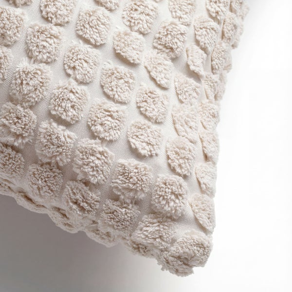 Dekokissen mit Punktmuster