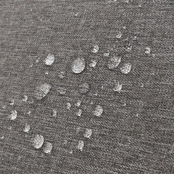 Nahaufnahme von wasserabweisendem Stoff mit Wassertropfen