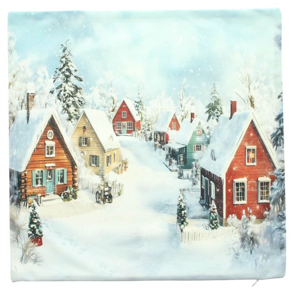 Quadratischer Kissenbezug mit weihnachtlichem Winterdorf Motiv in verschneiter Landschaft mit Holzhäusern.