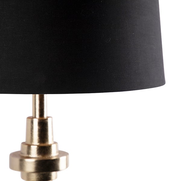 Tischleuchte mit schwarzem Lampenschirm und metallischem Fuß