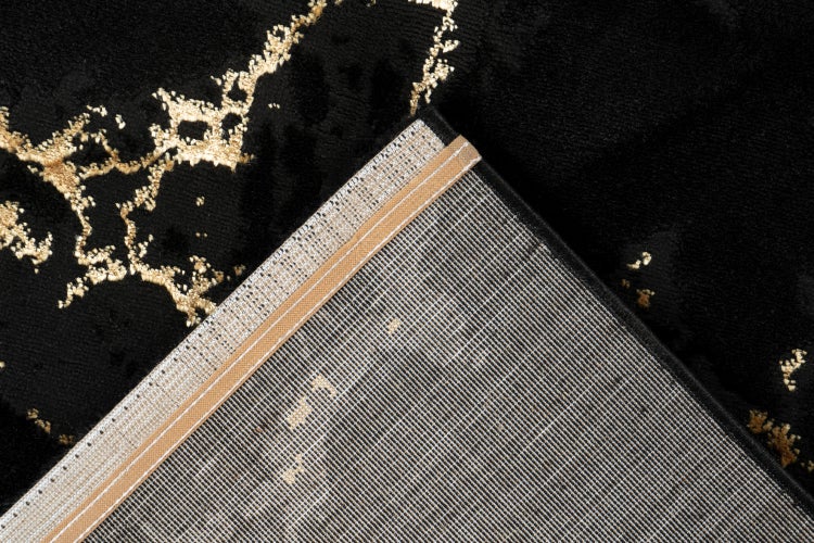 Rechteckiger Teppich im Vintage-Design mit Fransen an den Enden, verwaschenes Muster in Hellblau und Cremeweiß.