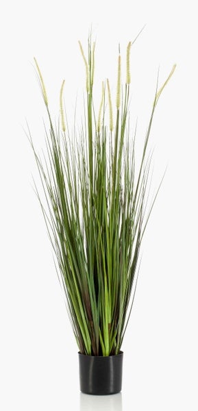 Nahaufnahme eines grünen künstlichen Pflanzenstiels mit strukturiertem Blattansatz.