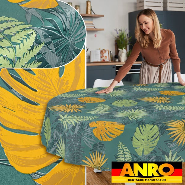 Runde Tischdecke mit tropischem Blättermuster in einer hellen Küche, Detailansicht der Oberflächenstruktur, ANRO Logo.