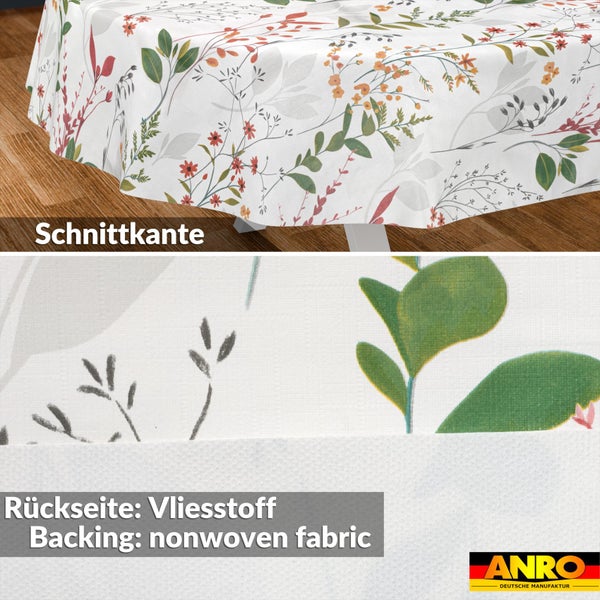 Tischdecke mit floralem Muster, Schnittkante und Rückseite aus Vliesstoff. ANRO Logo.