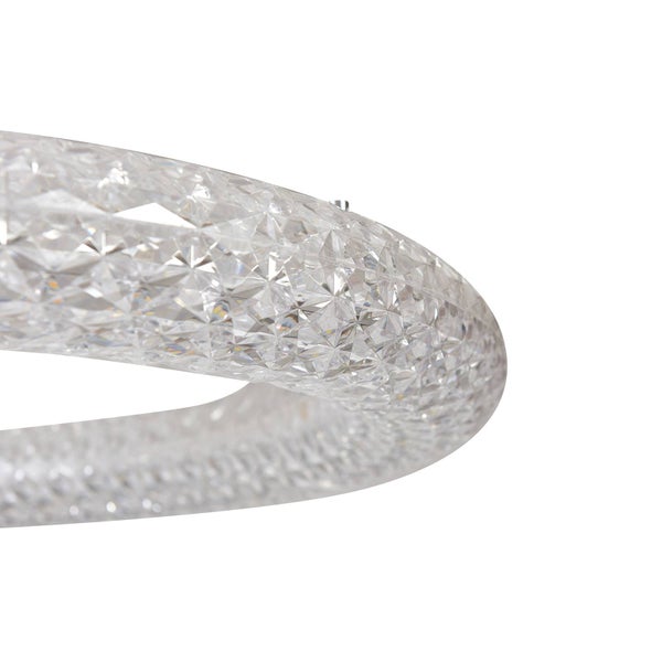 Nahaufnahme einer LED-Leuchte mit kristalliner, facettierter Oberfläche für funkelnde Lichteffekte.