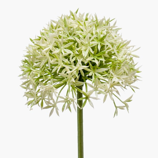 Künstliche Hortensie im schwarzen Kunststofftopf mit lila Blüten und grünen Blättern.
