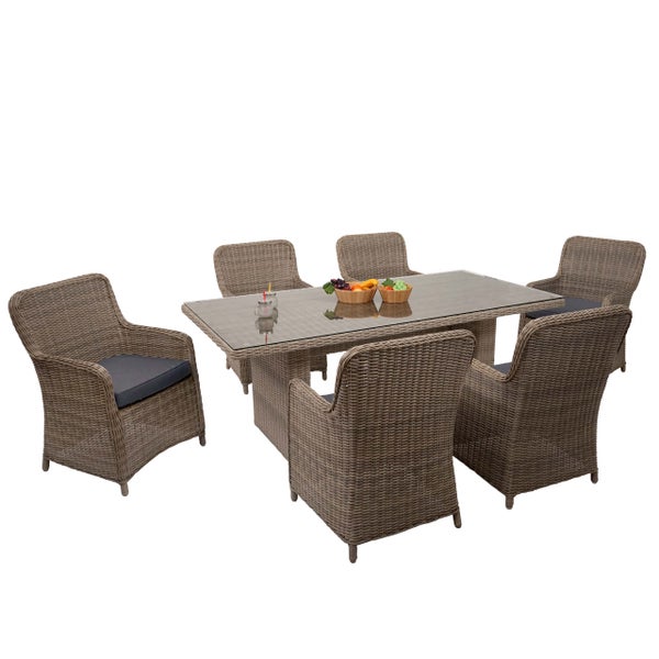 Gartenmöbel-Set aus Polyrattan bestehend aus einem Esstisch mit Glasplatte und sechs Sesseln inklusive Sitzkissen.