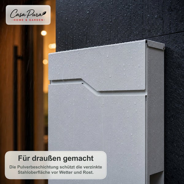 Moderner Briefkasten aus pulverbeschichtetem verzinktem Stahl an einer Hauswand montiert